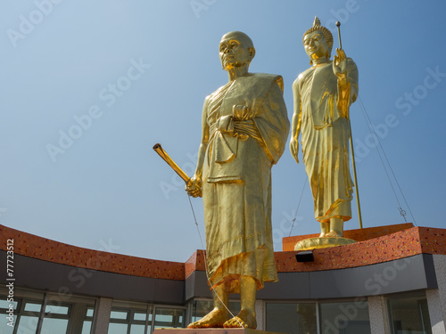 Statue of Buddha and Temple photo