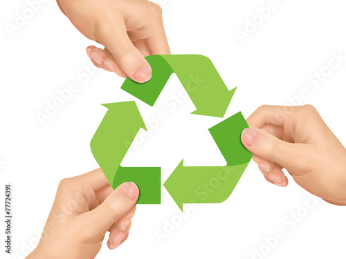 recycle concept: hands holding recycle icon