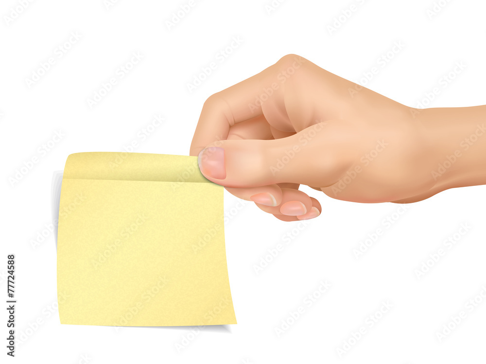 business concept: hand holding a sticky note business concept: hand holding a sticky note