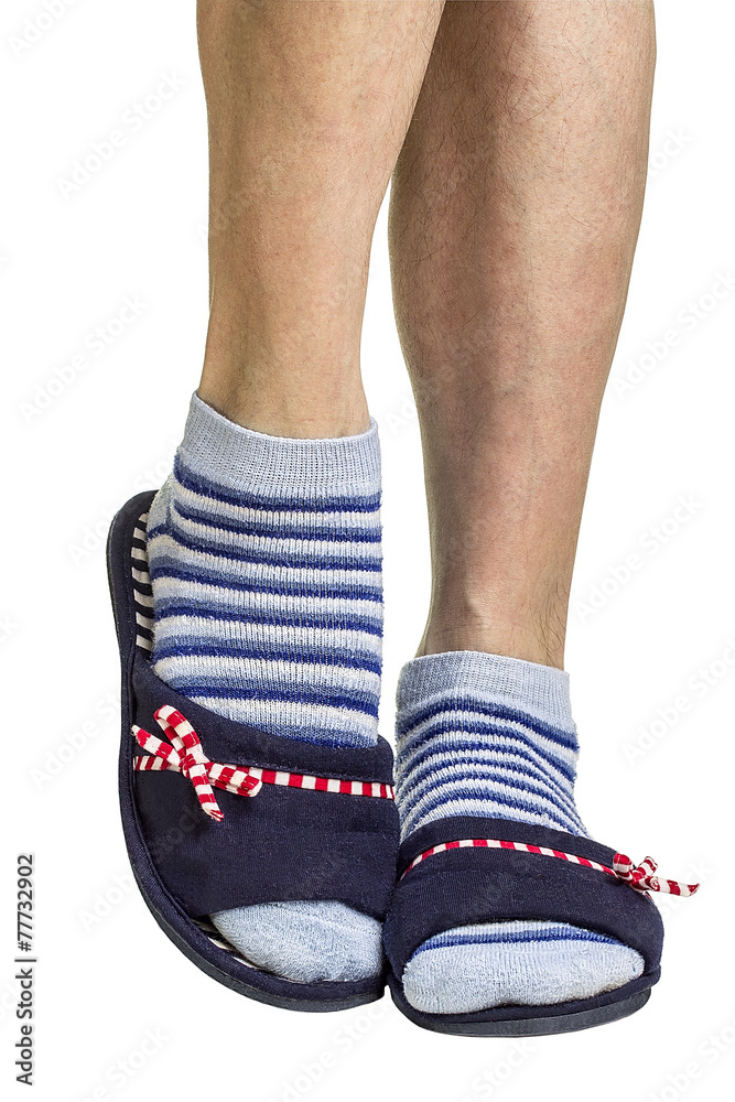 Male legs in women's slippers