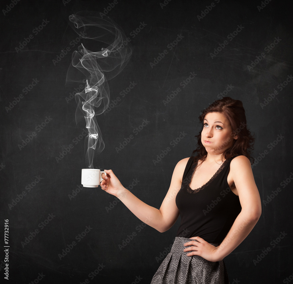 Businesswoman holding a white steamy cup