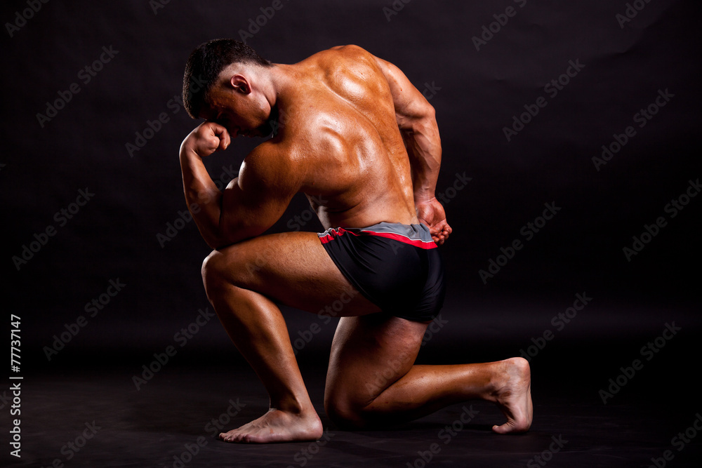 Fototapeta premium young bodybuilder posing