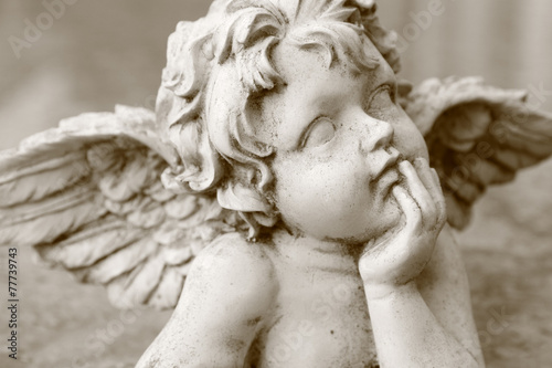 Billede på lærred image  of cherub figurine in sepia