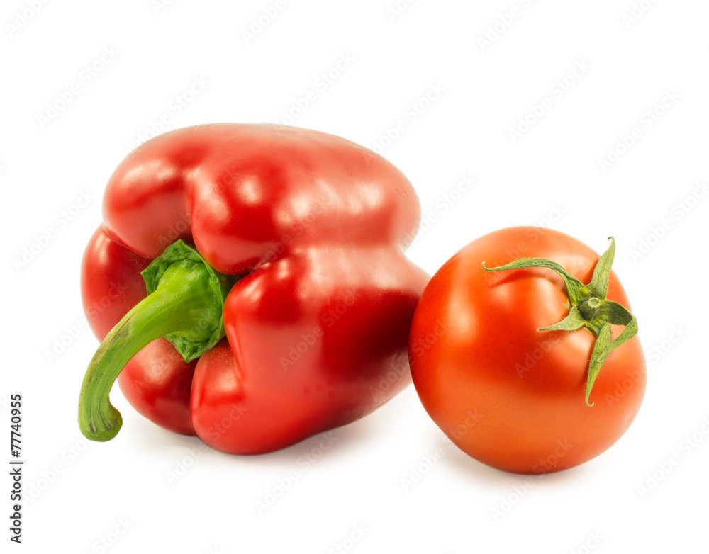 red bell pepper and tomato isolated on white background red bell pepper and tomato isolated on white background