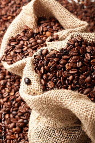 close up of jute bag full of coffee beans © MWiner