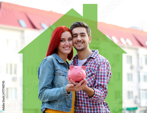 Loving couple in drawing house