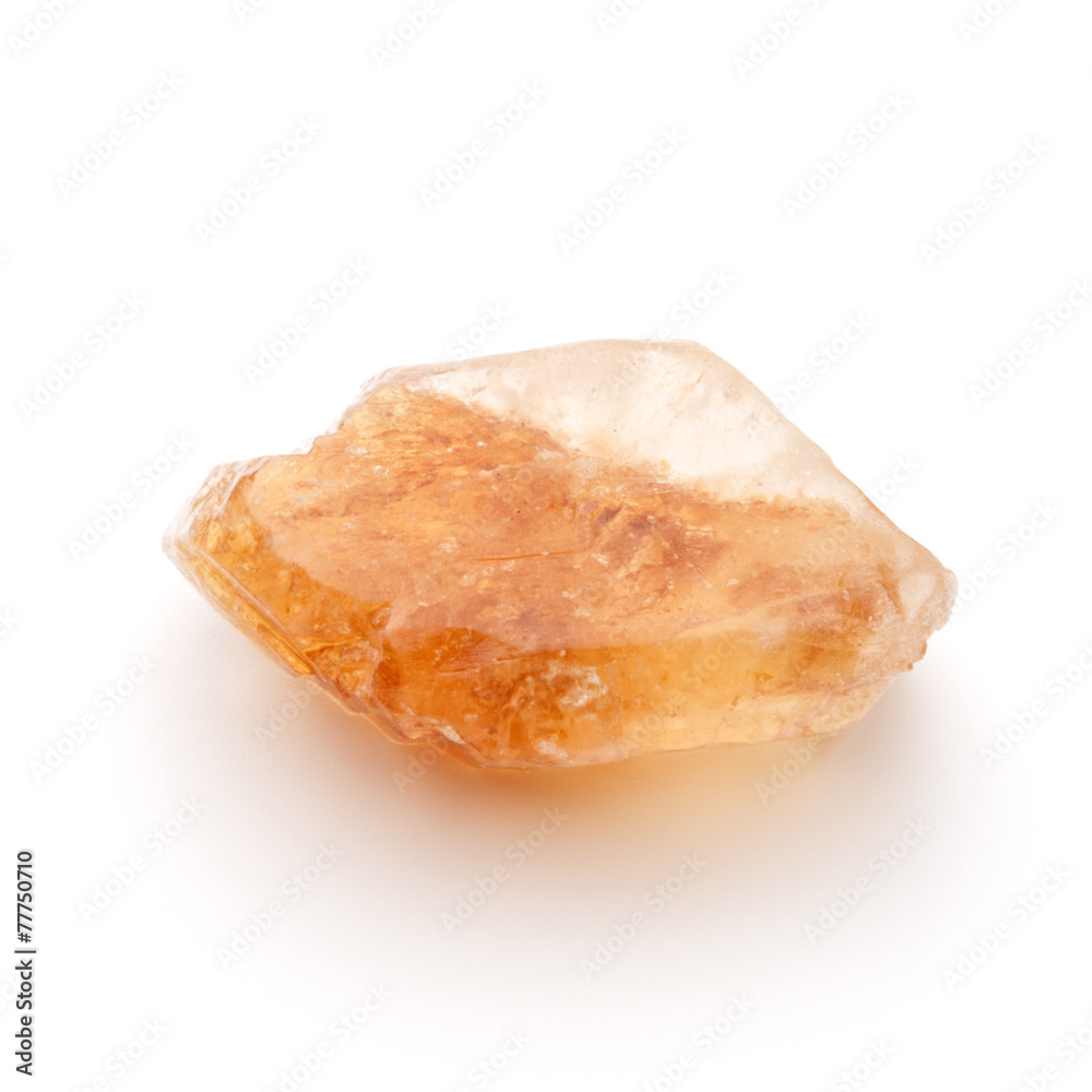 Brown caramelized lump cane sugar cube isolated on white backgro