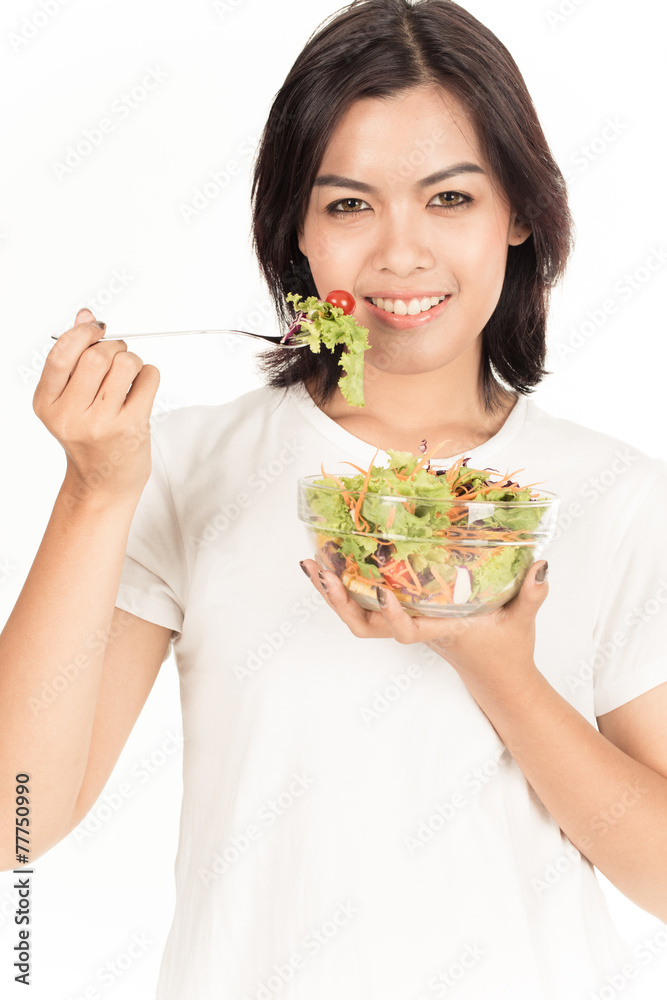 Pretty girl eating fresh vegetable salad Pretty girl eating fresh vegetable salad