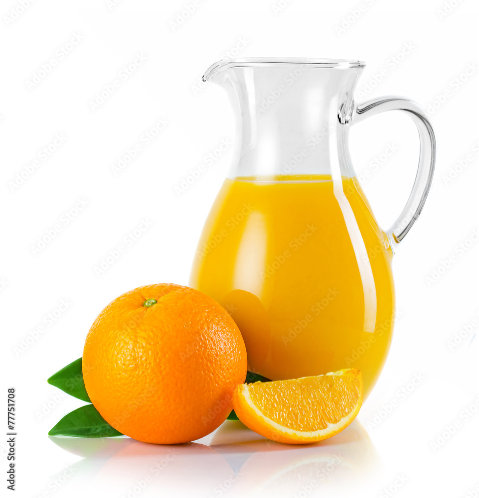 Jug with orange juice and fruits with green leaves isolated Stock Photo