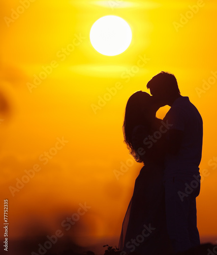фотографія couple of lovers at background
