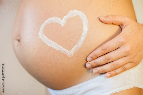 Wallpaper Mural Pregnant woman with concept of love Torontodigital.ca