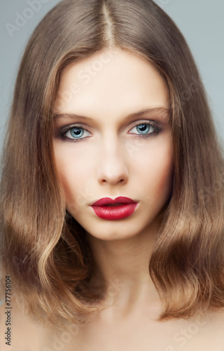Fashion portrait of young beautiful woman with perfect make up.