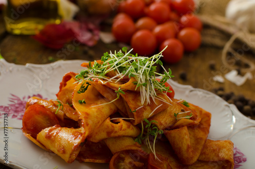 Pasta arrabiata with chilli and garlic organic photo