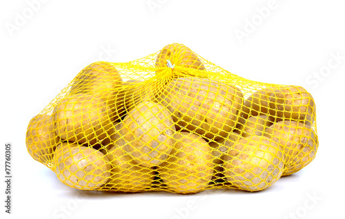 Potatoes in string-bag, Isolated, on white background