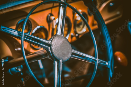 Fotografie Interior of vintage car. Vintage effect processing
