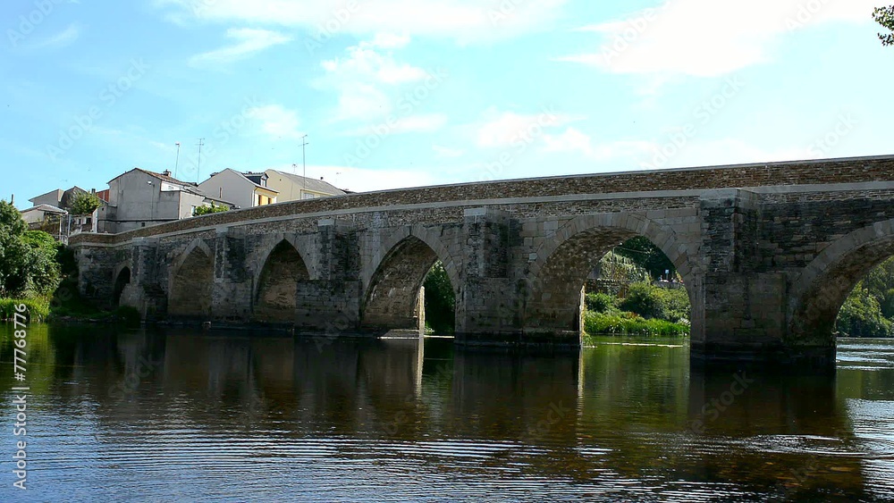 Medieval stone bridge over a river, Lugo, Spain Medieval stone bridge over a river, Lugo, Spain