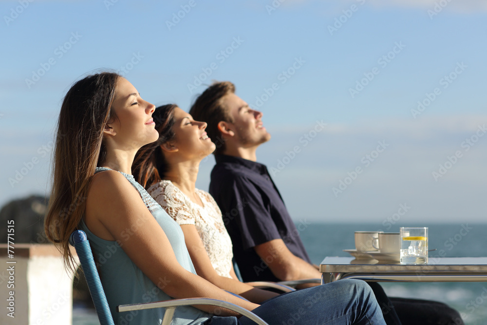 Group of friends breathing fresh air in a restaurant