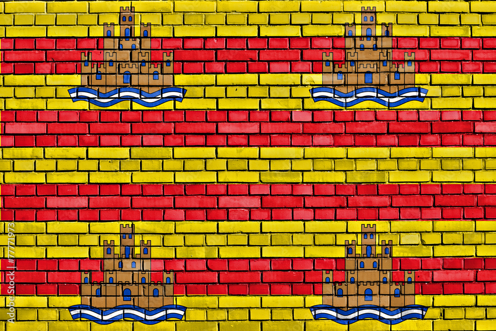 flag of Ibiza painted on brick wall