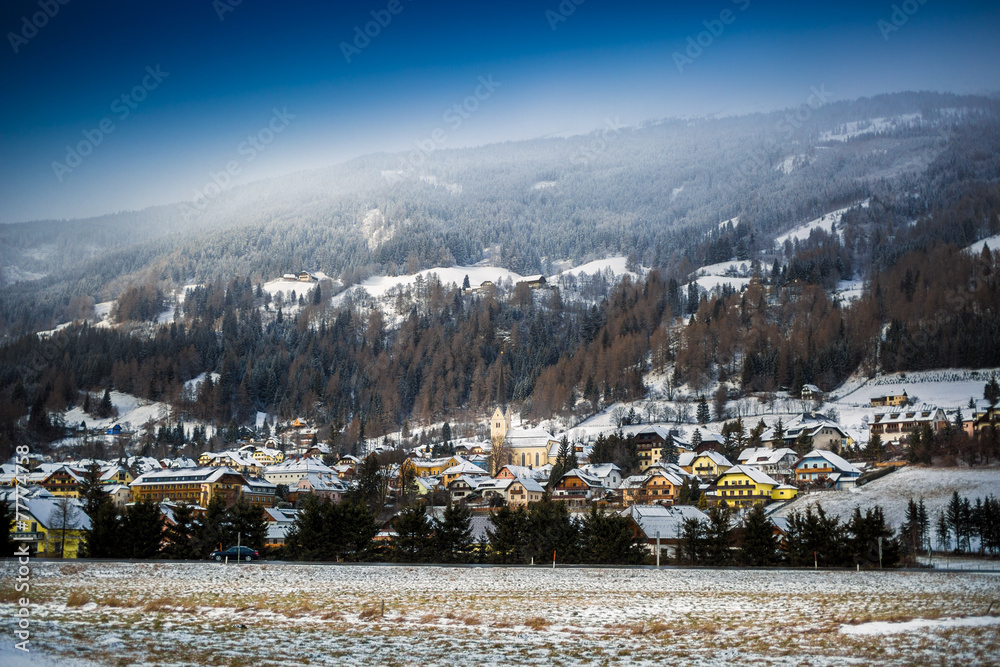 landscape of little town in high mountains at Austria