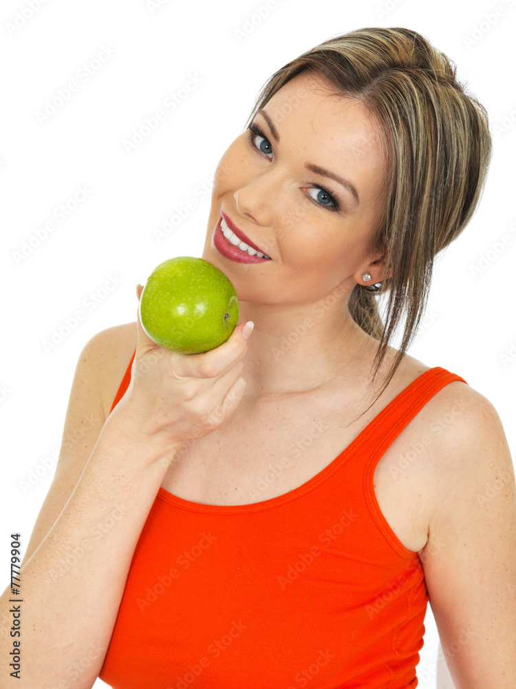 Young Woman Holding a Fresh Ripe Green Apple Young Woman Holding a Fresh Ripe Green Apple