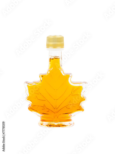 Leaf shape maple syrup bottle on white background