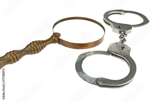 Retro Magnifying Glass and Handcuffs