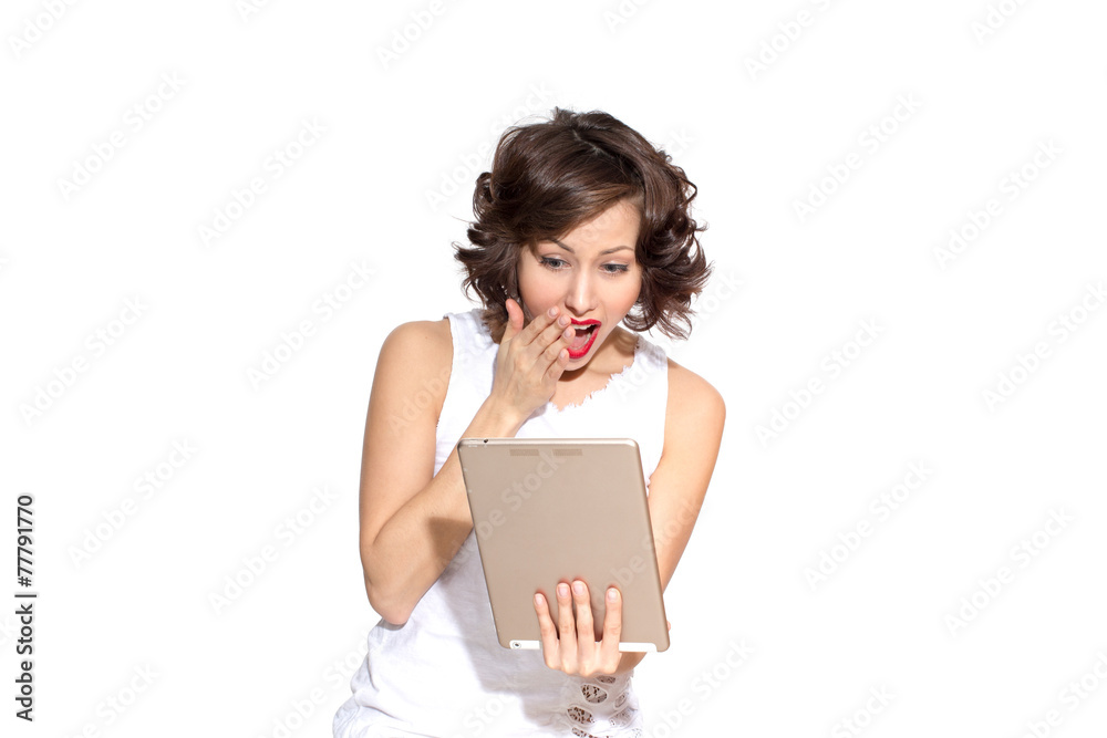 female model exited, shocked, surprised, looking at tablet pc female model exited, shocked, surprised, looking at tablet pc