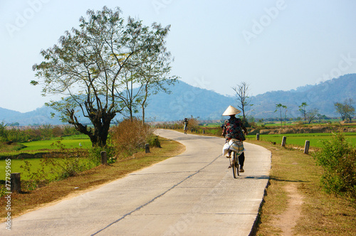 Vietnamese woman riding bicycle