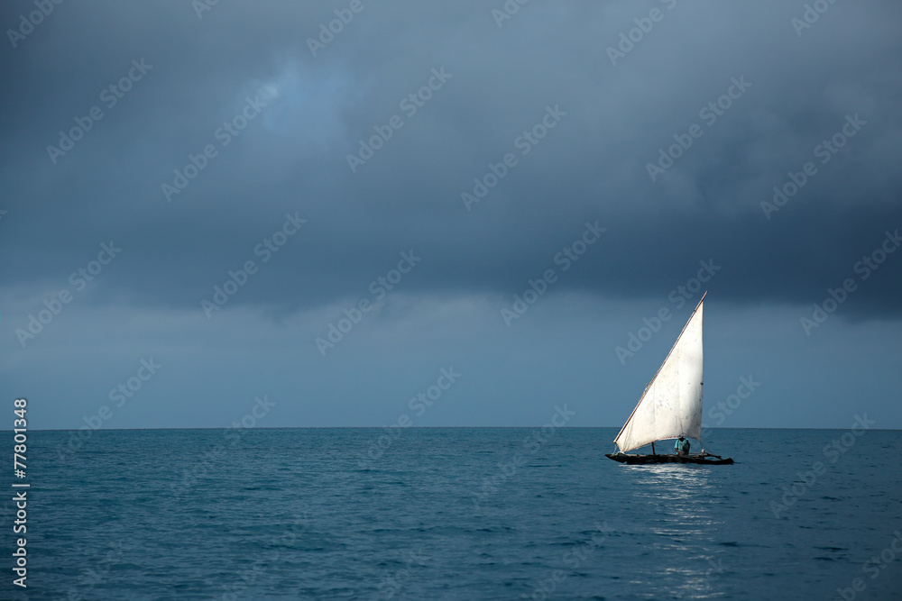 Wooden sailboat (dow) on water, Zanzibar island