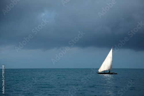 Wooden sailboat (dow) on water, Zanzibar island
