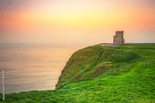 Obraz na plátně Tower on the Cliffs of Moher at sunset, Ireland