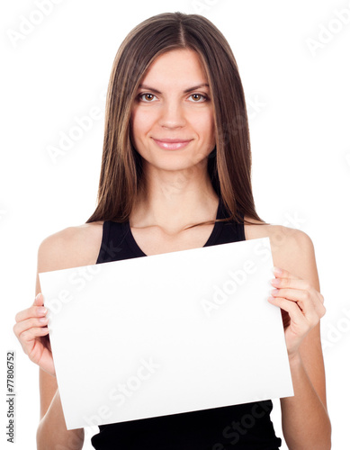 A woman holding a blank placard