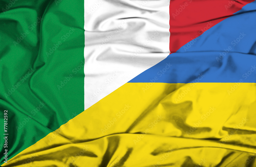 Obraz premium Waving flag of Ukraine and Italy