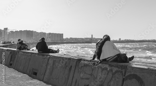 People on the parapet on the shore. Casablanca, Morocco