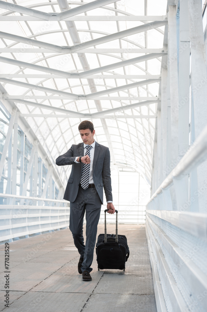 Man at the Airport with Suitcase Man at the Airport with Suitcase
