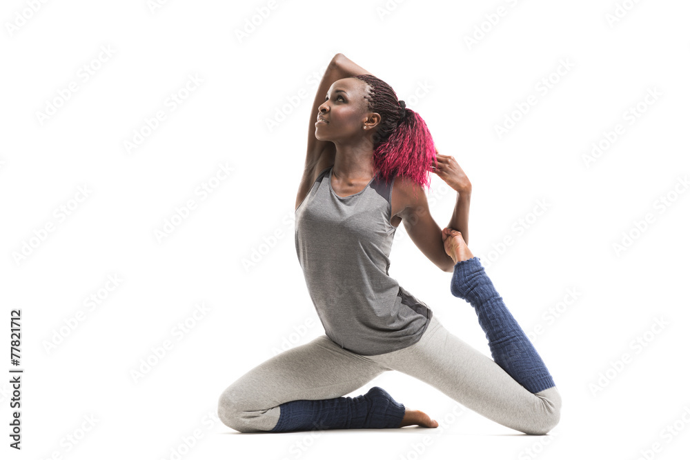 Young african woman doing yoga exercises Young african woman doing yoga exercises