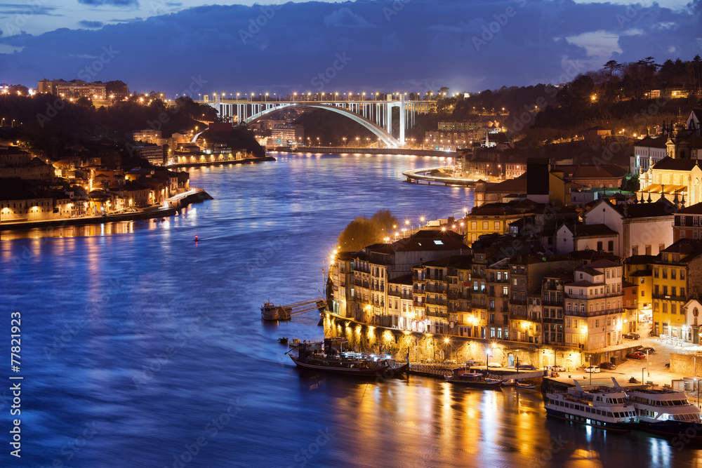 City of Porto by Douro River at Night in Portugal