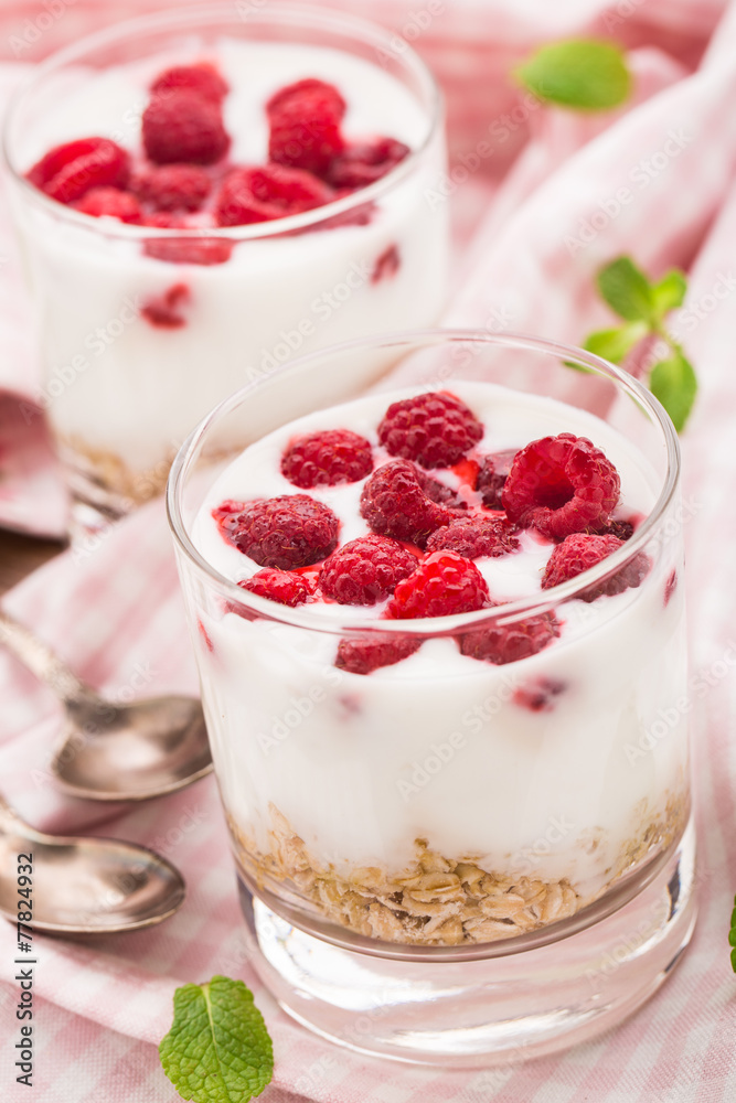 Yogurt with muesli and raspberries Yogurt with muesli and raspberries