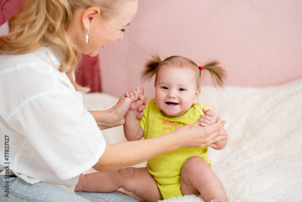 Happy mother and baby have fun pastime Happy mother and baby have fun pastime