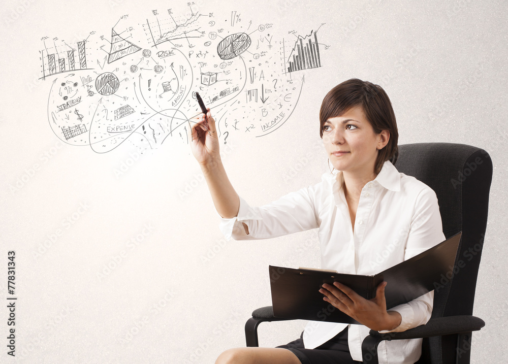 Pretty girl sketching graphs and diagrams on wall Pretty girl sketching graphs and diagrams on wall