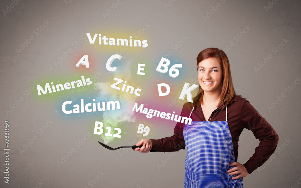Young woman cooking vitamins and minerals Young woman cooking vitamins and minerals