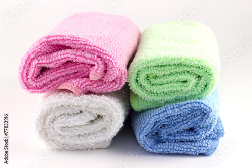 Colorful towel rolls on each other