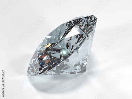 Side view of a shining diamond on a white background