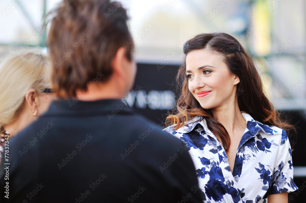 portrait of a happy beautiful woman with red lips communicates w portrait of a happy beautiful woman with red lips communicates w