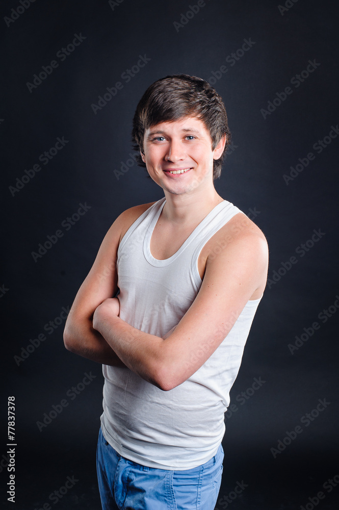 happy portrait of a man on a black background happy portrait of a man on a black background