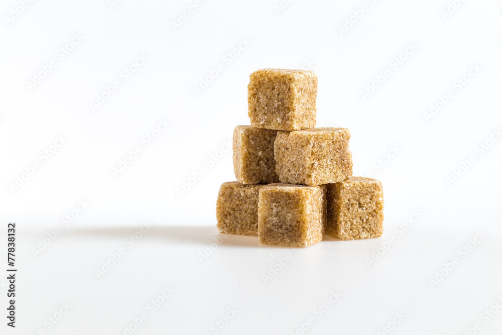 cane sugar cubes on a white background cane sugar cubes on a white background