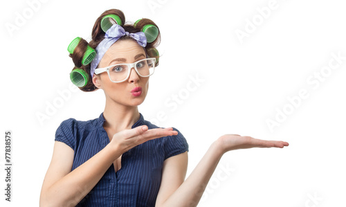 Young woman with curlers
