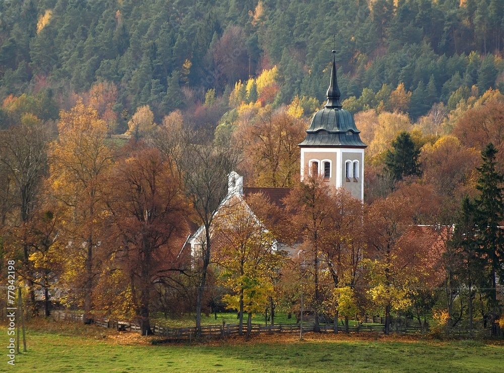 North East Poland landscape with small church in village