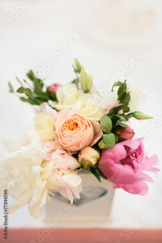 floral arrangement of peonies and roses