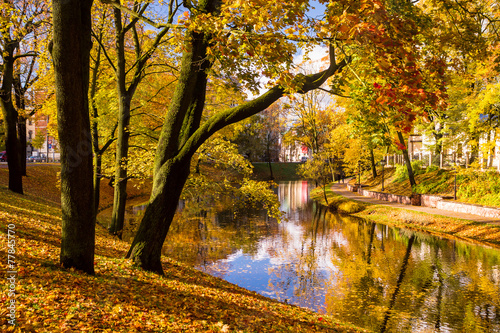 Park in the fall and pond in the center of Riga